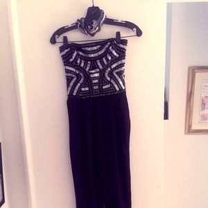 Saks Jumpsuit with Matching Necklace Included